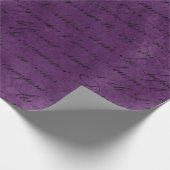 Schwarzes Drehbuch auf Lila Geschenkpapier (Ecke)