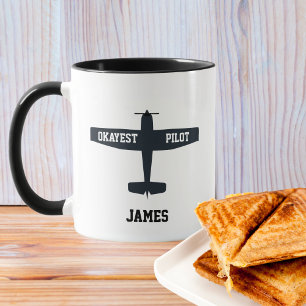 Schwarzes Flugzeug & lustiger Spruch Okayester Pil Tasse