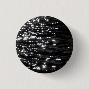 Schwarzes glitzerndes Wasser Button