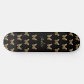 Schwarzes Goldbutterfliegenmuster Skateboard (Horizontal)