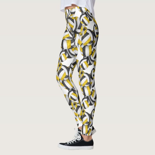 Schwarzes goldenes Mannschaftsfarbenmuster Leggings (Links)