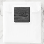 Schwarzes Holzbild. Quadratischer Aufkleber (Tasche)