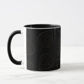Schwarzes Kaffeetasse mit Goldblattmuster (Links)