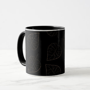 Schwarzes Kaffeetasse mit Goldblattmuster