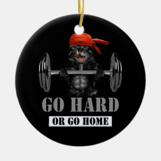 Schwarzes Katzengewicht in Fitness Gym wird schwer Keramik Ornament