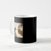 Schwarzes Katzenkätzchen beißt Gottes Hand Kaffeetasse (Vorderseite Links)