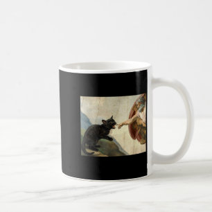 Schwarzes Katzenkätzchen beißt Gottes Hand Kaffeetasse