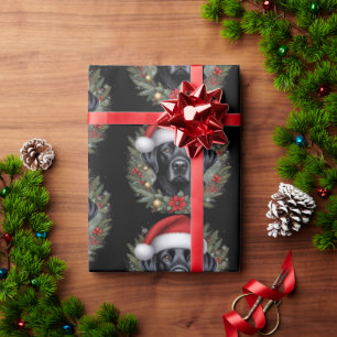 Schwarzes Labrador mit festlicher Weihnachtsmannmü Geschenkpapier