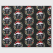 Schwarzes Labrador mit festlicher Weihnachtsmannmü Geschenkpapier (Flach)
