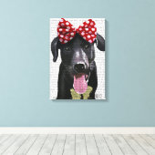 Schwarzes Labrador mit rotem Bogen auf Kopf Leinwanddruck (Insitu (Holzboden))