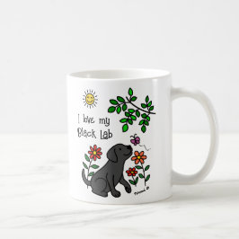 Schwarzes Labrador und grüne Tasse