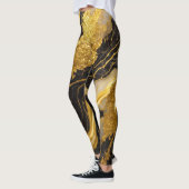 Schwarzes Marmormuster mit Gold Leggings (Links)