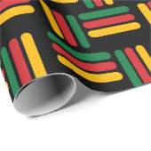 Schwarzes Muster in Gelb, Rot und Grün Geschenkpapier (Rolleneckpunkt)