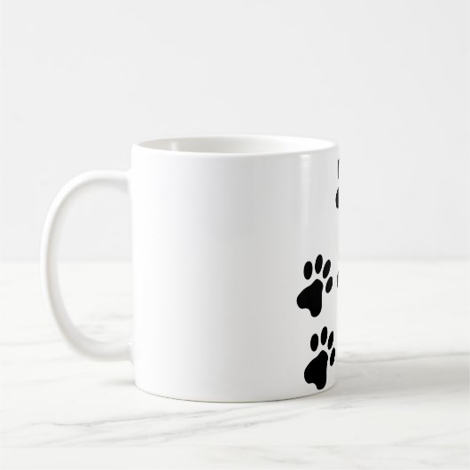 schwarzes niedliches Hundetatzenhündchen Kaffeetasse (Links)