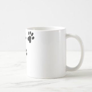 schwarzes niedliches Hundetatzenhündchen Kaffeetasse