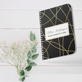 Schwarzes Notebook mit Metallic-Akzenten Planer