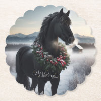 Schwarzes Pferd im Schnee mit Weihnachtskranz