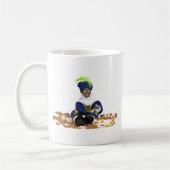 Schwarzes Piet mit gingernuts Geschenken und Kaffeetasse (Links)