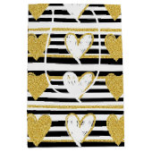 Schwarzes Streifen-Gold-Herz-Glamour-Muster (1) Mittlere Geschenktüte (Vorderseite)