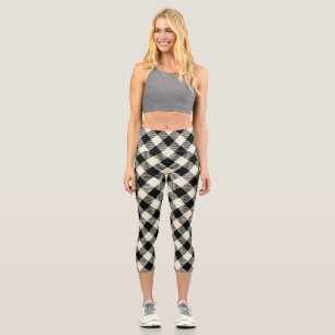 Schwarzes und beiges diagonales Gingham-Karomuster Capri Leggings