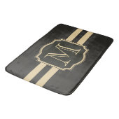 Schwarzes und goldenes Monogramm Badematte (Schrägansicht)
