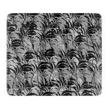 Schwarzes und graues Palmen-Schneidebrett