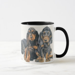 Schwarzes und TANcoonhound-Welpen Tasse