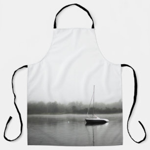 SCHWARZES UND WEISSES BOOT AM SEE SCHÜRZE