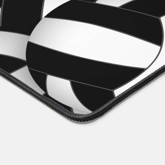 Schwarzes Volleyball-Team färbt Sportmuster Schreibtischunterlage (Ecke)