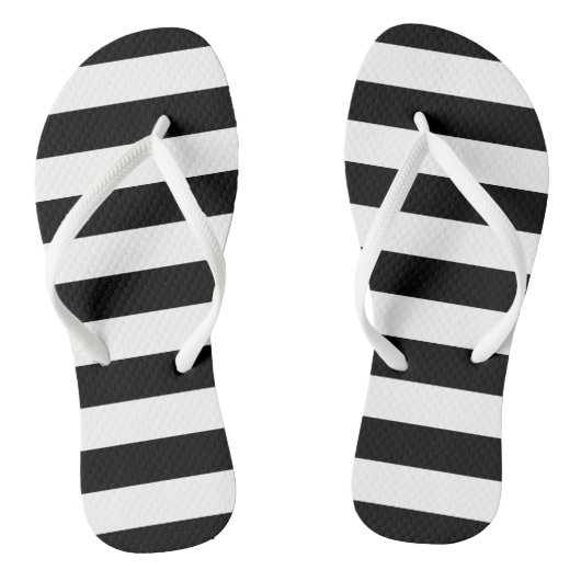 Schwarzweiss-gestreifte drehen Reinfälle um Badesandalen (Fußbett)