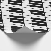 Schwarzweiss-Klavier befestigt Geschenkpapier (Ecke)