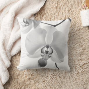 Schwarzweiss-Orchideen auf dem Stamm-Kissen Kissen