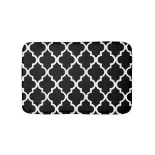 Schwarzweiss-Quatrefoil deckt Muster mit Ziegeln Badematte