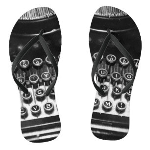 Schwarzweiss-Schreibmaschine Badesandalen