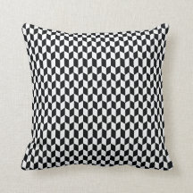 Schwarzweißes Kissen mit geometrischem Muster