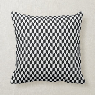Schwarzweißes Kissen mit geometrischem Muster