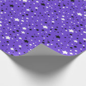 Schwarzweißsterne auf lila geschenkpapier (Ecke)