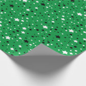 Schwarzweißsterne in Grün Geschenkpapier (Ecke)