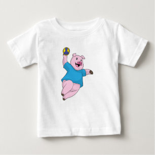 Schwein als Handballspieler mit Handball Baby T-shirt