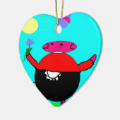 Schwein mit Blume und Schmetterling in der Sonne, Keramik Ornament (Links)