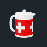 Schweiz Flaggenteapot<br><div class="desc">Fügen Sie Ihrer Teesammlung eine Touch Schweizer Eleganz mit unserem exklusiven Teekessel unter Schweizer Flagge hinzu! Dieser Teekessel mit viel Liebe zum Detail ist mehr als nur ein funktionaler Gegenstand, er ist ein Feier des kulturellen und historischen Stolzes der Schweiz. Das lebendige Design zeigt die berühmte Schweizer Fahne und macht...</div>