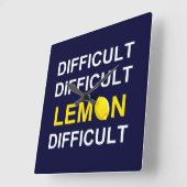 "Schwer, schwierig, Zitrone, schwierig" Quadratische Wanduhr (Winkel)