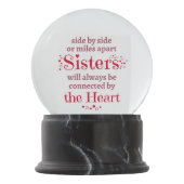 Schwestern werden immer durch das Herz verbunden Schneekugel (Vorderseite)