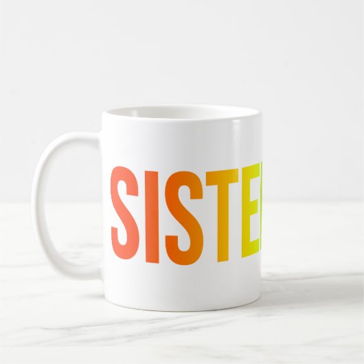 SCHWESTERSCHAFT Wordmark Tasse Regenbogen (Links)