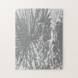 Schwieriger Puzzle am Ufer des Schwarzen Palms