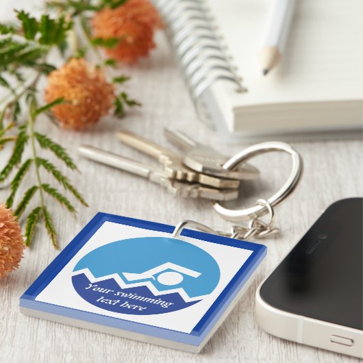 Schwimmgeschenke, Schwimmer auf einem blauen Kreis Schlüsselanhänger (Vorderseite rechts)