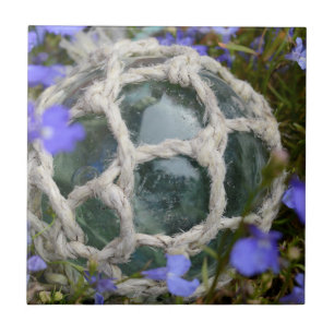 Schwimmkörper unter Blumen Fliese