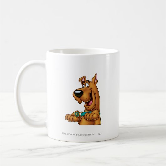 Scooby-Doo bricht auf Kaffeetasse (Links)
