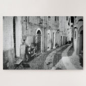 Scooter in einer Straße in Italien in Schwarz-Weiß Puzzle (Horizontal)