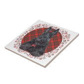 Scottish Terrier über Tartan Fliese (Seite)